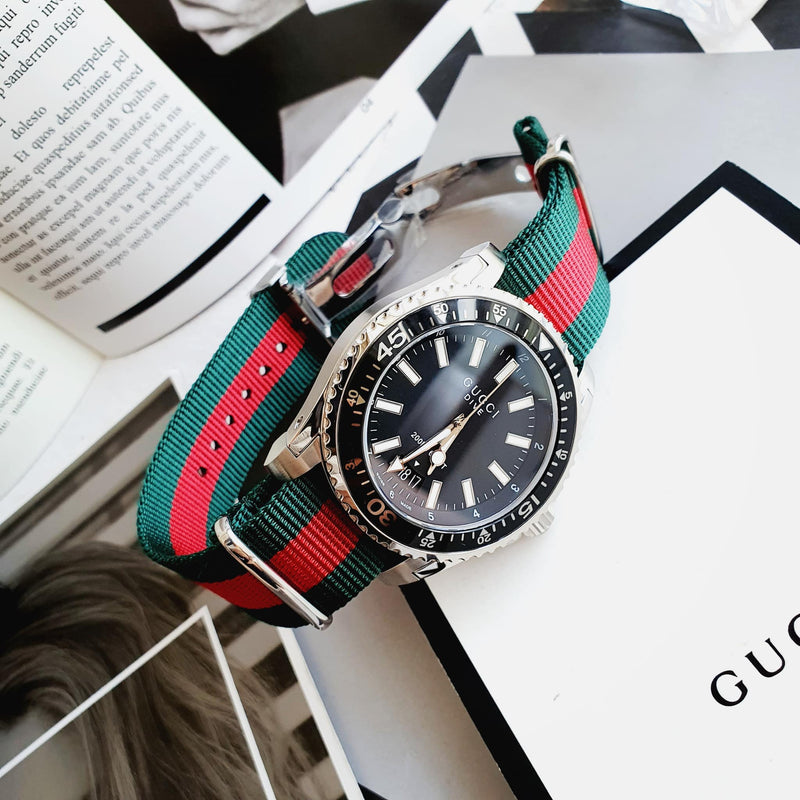 Shop Gucci Dive Black Dial Two Tone NATO Strap Watch For Men - YA136206 in USA