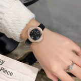 Shop Swarovski Crystal Flower Black Dial Black Leather Strap Watch for Women - 5552421 in USA