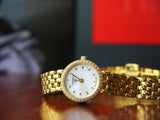 Tissot T-Lady Lovely Mother of Pearl Dial Gold Steel Strap Watch For Women - T058.009.63.116.00 Buy Now By Tissot