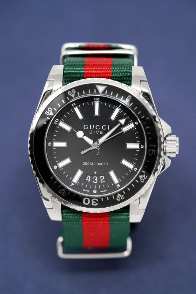 Shop Gucci Dive Black Dial Two Tone NATO Strap Watch For Men - YA136206 in USA