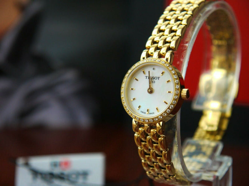 Tissot T-Lady Lovely Mother of Pearl Dial Gold Steel Strap Watch For Women - T058.009.63.116.00 Buy Now By Tissot