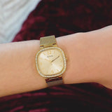 Guess Tapestry Diamonds Gold Dial Gold Mesh Bracelet Watch for Women - GW0354L2 Buy Now By Guess