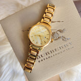 Shop Burberry The Classic Champagne Dial Gold Steel Strap Watch for Women - BU10109 in USA