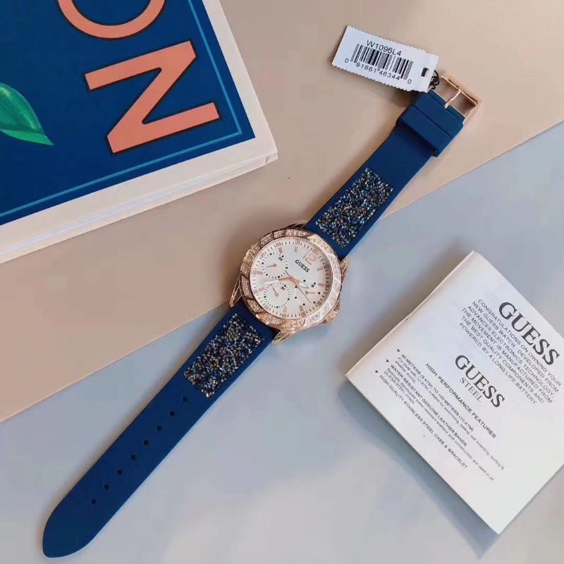Guess Swirl Analog Quartz White Dial Blue Rubber Strap Watch for Women - W1096L4 Buy Now By Guess