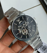 Emporio Armani Meccanico Automatic Black Dial Silver Steel Strap Watch For Men - AR60055 Buy Now By Emporio Armani
