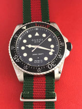 Shop Gucci Dive Black Dial Two Tone NATO Strap Watch For Men - YA136206 in USA