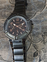 Guess Rigor Multifunction Black Dial Black Steel Strap Watch For Men - W0218G1 Buy Now By Guess