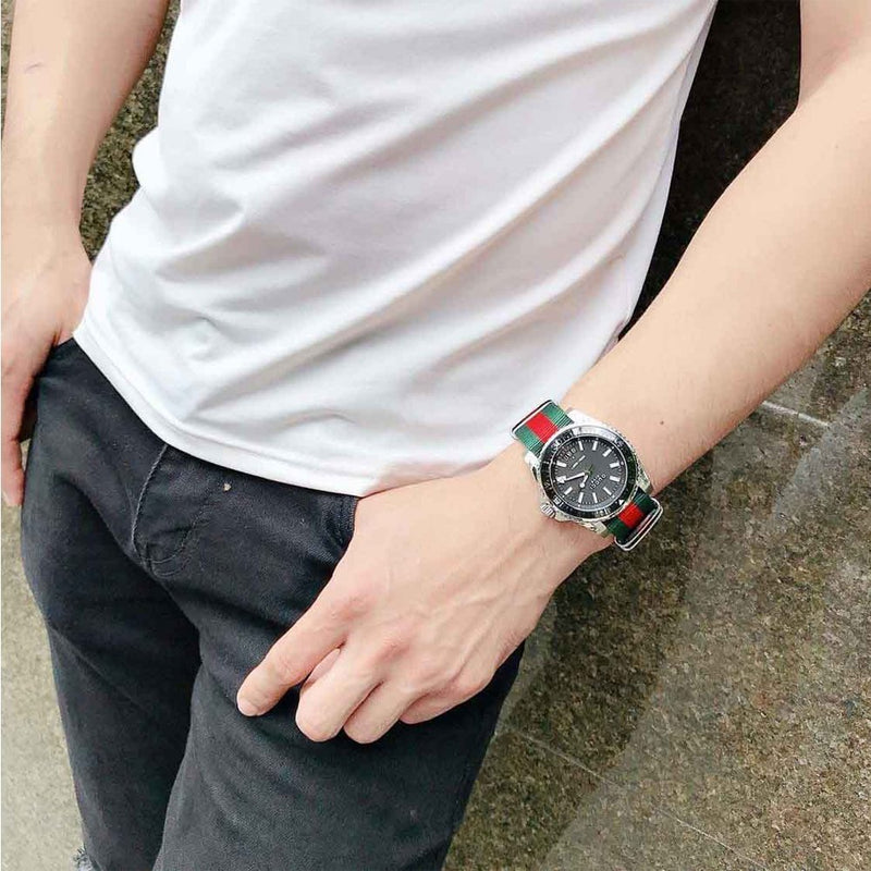 Shop Gucci Dive Black Dial Two Tone NATO Strap Watch For Men - YA136206 in USA