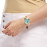 Shop Swarovski Daytime Crystals Turquoise Dial Gold Steel Strap Watch for Women - 5182212 in USA