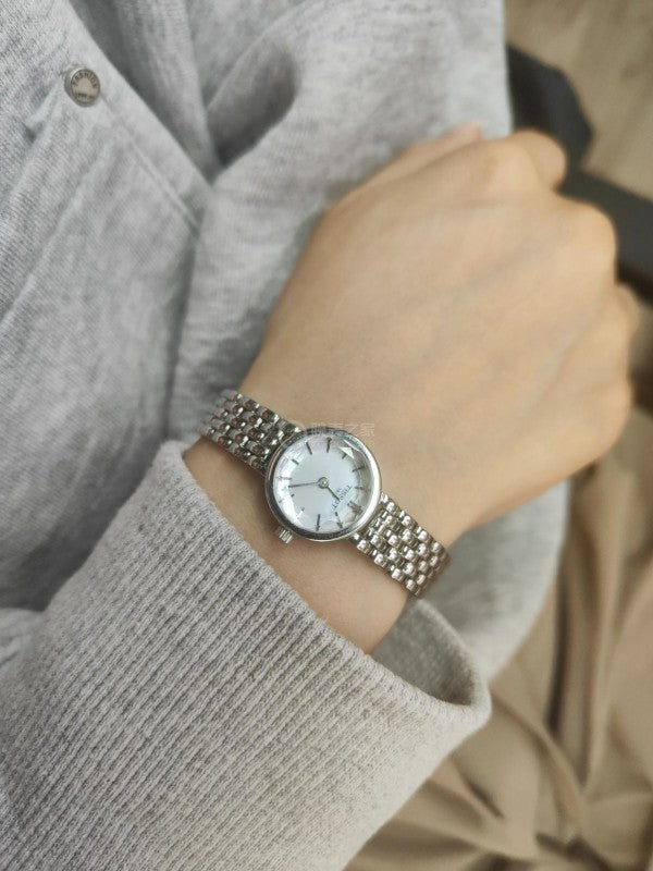 Tissot T Lovely Mother of Pearl Dial Silver Steel Strap Watch for Women - T140.009.11.111.00 Buy Now By Tissot