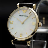 Emporio Armani Gianni T-Bar Quartz Mother of Pearl Dial Black Leather Strap Watch For Women - AR1910 Buy Now By Emporio Armani