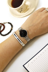 Daniel Wellington Petite Sterling Black Dial Silver Mesh Bracelet Watch For Women - DW00100218 Buy Now By Daniel Wellington