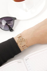 Daniel Wellington Petite Rose Gold Dial Rose Gold Mesh Bracelet Watch For Women - DW00100470 Buy Now By Daniel Wellington