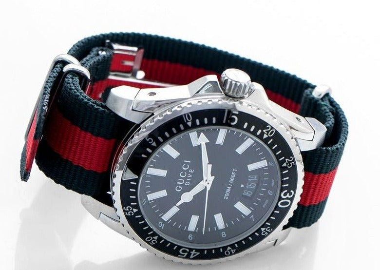 Shop Gucci Dive Black Dial Two Tone NATO Strap Watch For Men - YA136206 in USA