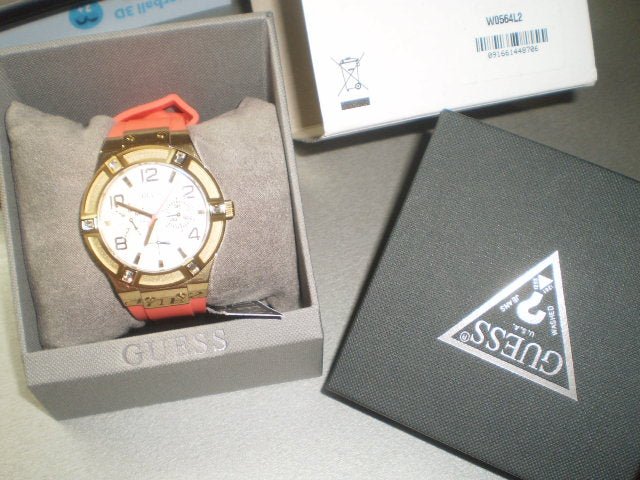 Guess Jet Setter Golden Dial Orange Rubber Watch For Women - W0564L2 Buy Now By Guess