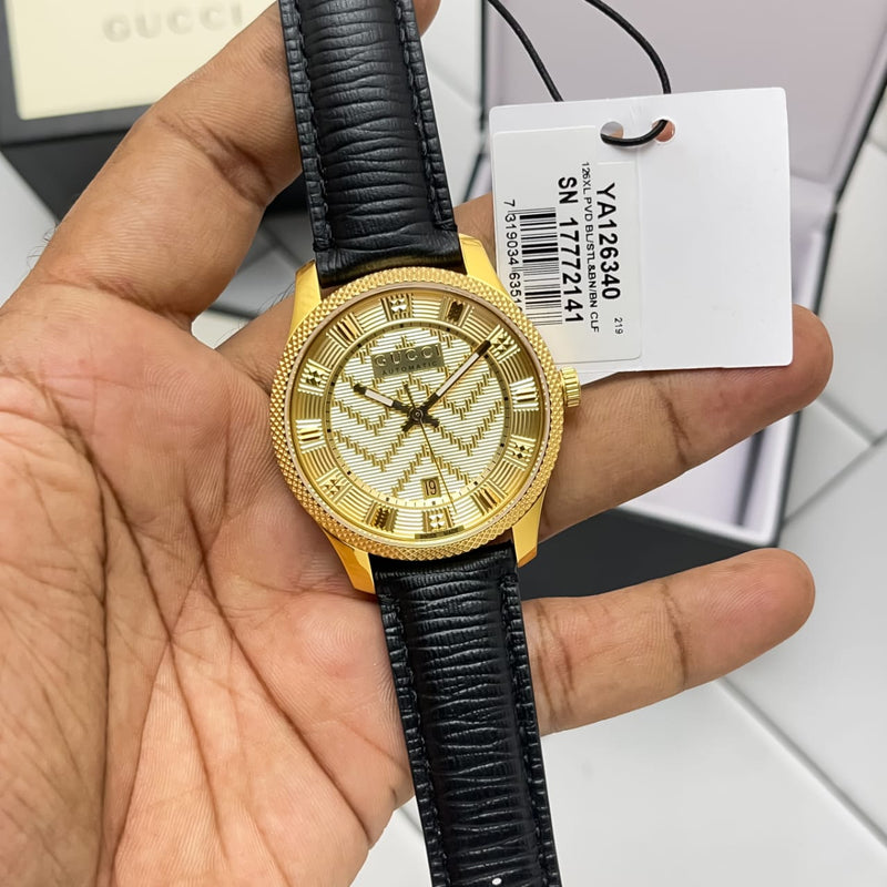 Shop Gucci Eryx Automatic Chevron Gold Dial Black Leather Strap Watch For Men - YA126340 in USA
