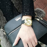 Guess G Twist Gold Dial Black Leather Strap Watch for Women - W0911L3 Buy Now By Guess