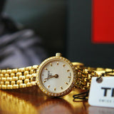 Tissot T-Lady Lovely Mother of Pearl Dial Gold Steel Strap Watch For Women - T058.009.63.116.00 Buy Now By Tissot