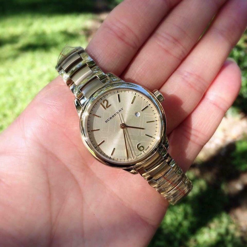 Shop Burberry The Classic Champagne Dial Gold Steel Strap Watch for Women - BU10109 in USA