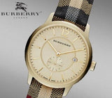Shop Burberry The Classic Round Gold Dial Brown Leather Strap Unisex Watch - BU10001 in USA
