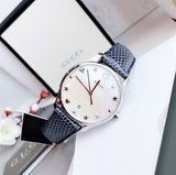 Gucci G-Timeless Signature Mother of Pearl Silver Dial Blue Leather Strap Watch For Women - YA1264049 Buy Now By Gucci
