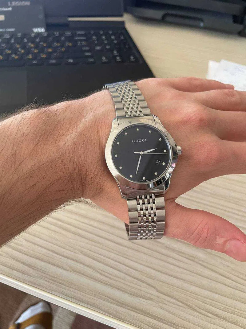Shop Gucci G Timeless Diamonds Black Dial Silver Steel Strap Watch For Men - YA126405 in USA