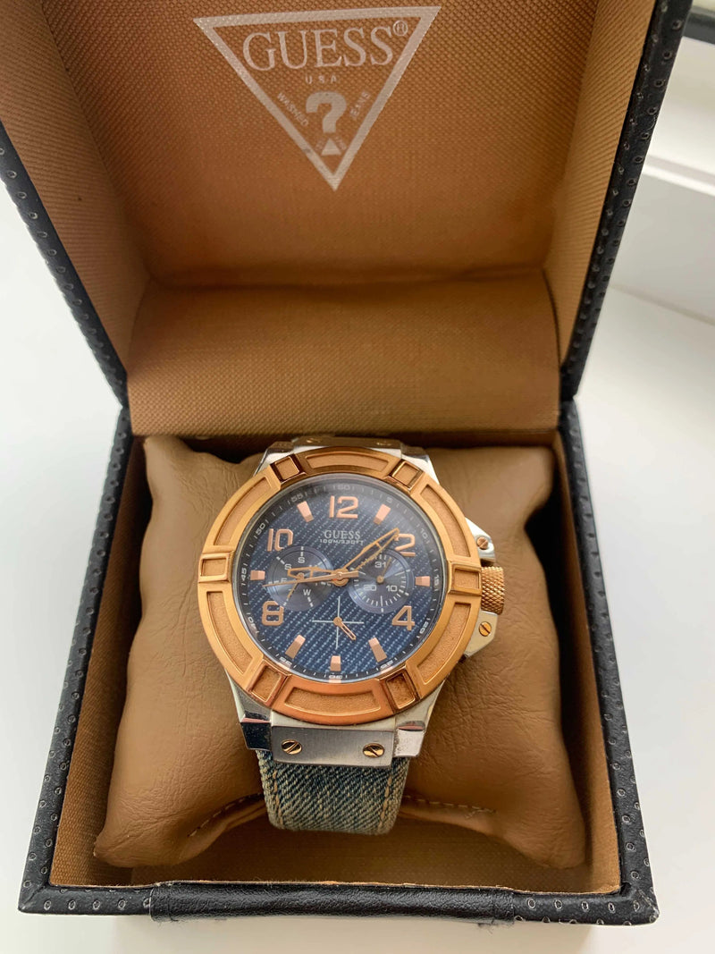 Guess Rigor Analog Blue Dial Blue Denim Strap Watch For Men - W0040G6 Buy Now By Guess
