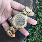 Guess Sassy Analog Quartz Gold Dial Gold Steel Strap Watch For Women - W0705L2 Buy Now By Guess