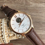 Tissot Tradition Powermatic 80 Open Heart Silver Dial Brown Leather Strap Watch For Men - T063.907.36.038.00 Buy Now By Tissot