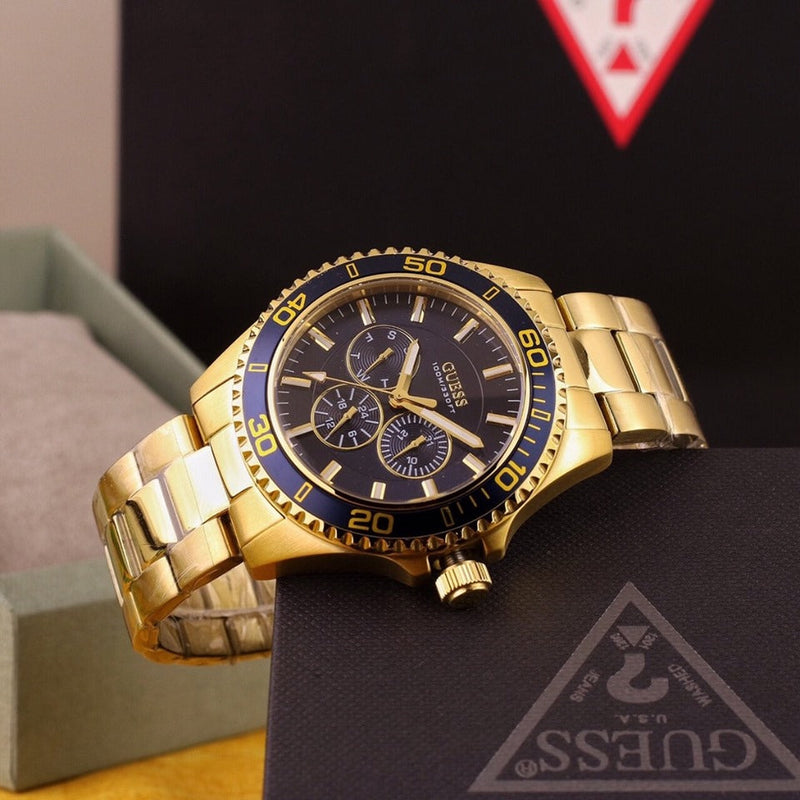 Shop Guess Chaser Multifunction Blue Dial Gold Steel Strap Watch for Men - W0172G5 in USA