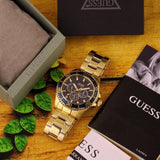 Shop Guess Chaser Multifunction Blue Dial Gold Steel Strap Watch for Men - W0172G5 in USA
