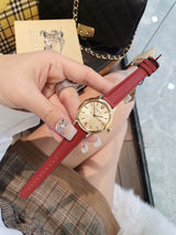 Shop Burberry The Classic Gold Dial Red Leather Strap Watch for Women - BU10102 in USA