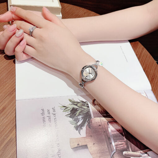 Shop Swarovski Crystal Flower Silver Dial Silver Steel Strap Watch for Women - 5547622 in USA