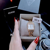 Shop Guess Vanity Diamonds Silver Dial Gold Steel Strap Watch for Women - W1030L4 in USA