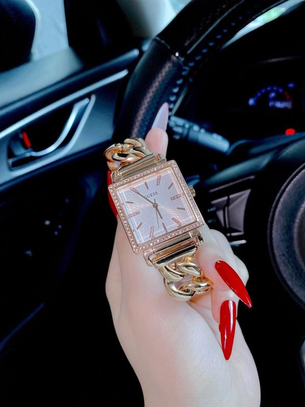Shop Guess Vanity Diamonds Silver Dial Gold Steel Strap Watch for Women - W1030L4 in USA