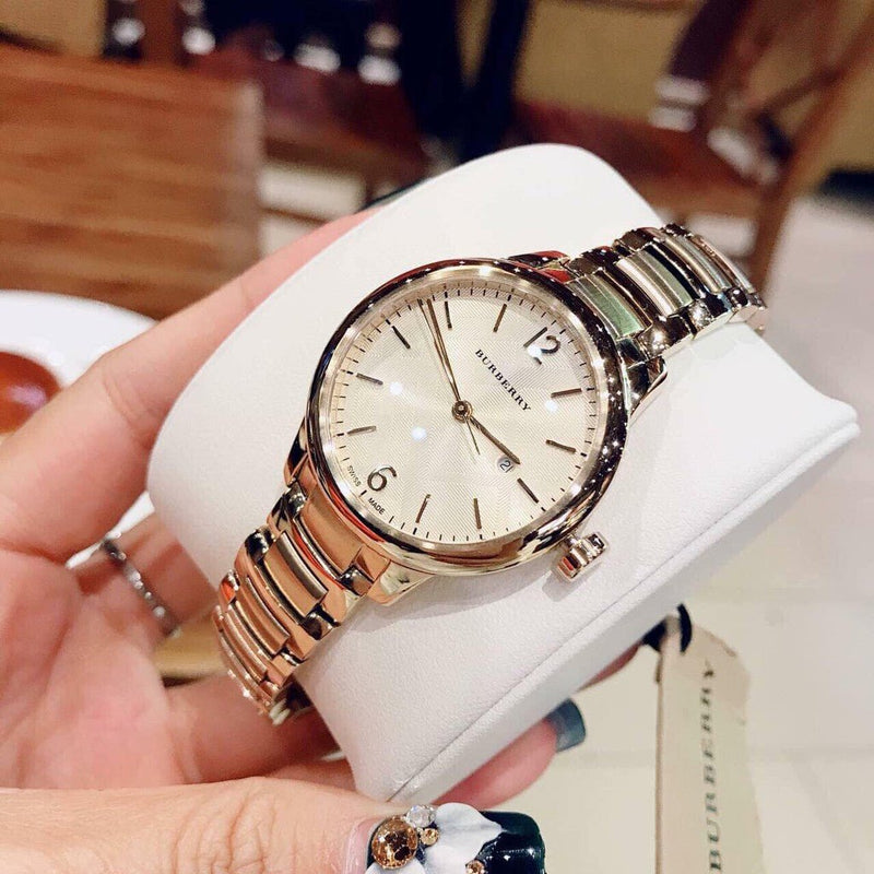 Shop Burberry The Classic Champagne Dial Gold Steel Strap Watch for Women - BU10109 in USA