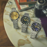 Seiko 5 Sports SNXS Automatic Gold Dial Silver Steel Strap Watch for Men - SRPL59K1