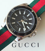 Shop Gucci Dive Black Dial Two Tone NATO Strap Watch For Men - YA136206 in USA