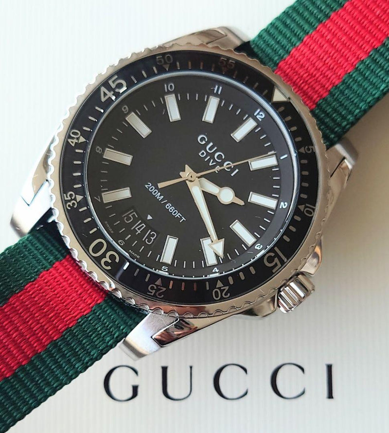 Shop Gucci Dive Black Dial Two Tone NATO Strap Watch For Men - YA136206 in USA