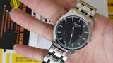 Tissot T Trend Couturier Chronograph Black Dial Silver Steel Strap Watch For Men - T035.410.11.051.00 Buy Now By Tissot