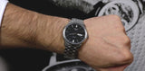 Tissot Automatics III Black Dial Silver Steel Strap Watch For Men - T065.430.11.051.00 Buy Now By Tissot