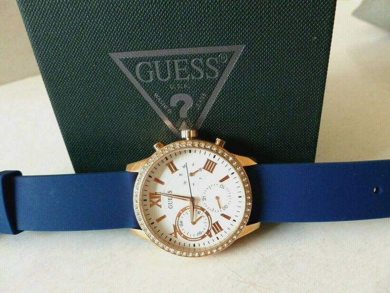 Guess Solar White Rose Gold Dial Blue Rubber Strap Watch For Women - W1135L3 Buy Now By Guess