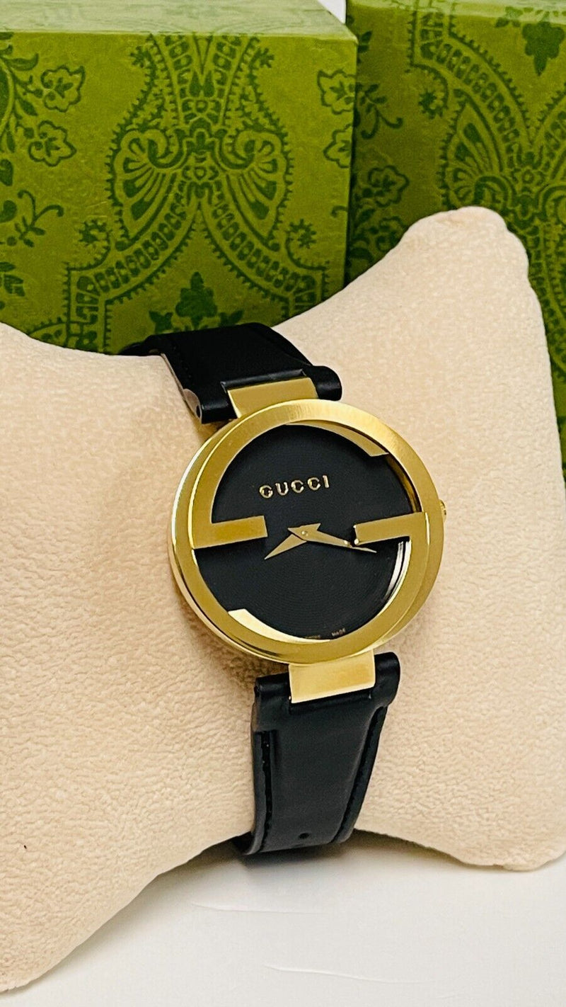 Gucci Interlocking G Gold Black Dial Black Leather Strap Unisex Watch - YA133326 Buy Now By Gucci