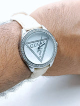 Guess Mini Triangle Quartz Diamonds Silver Dial White Leather Strap Watch For Women - W65006L1 Buy Now By Guess