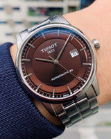 Tissot Luxury Powermatic 80 Brown Dial Silver Steel Strap Watch For Men - T086.407.11.291.00 Buy Now By Tissot