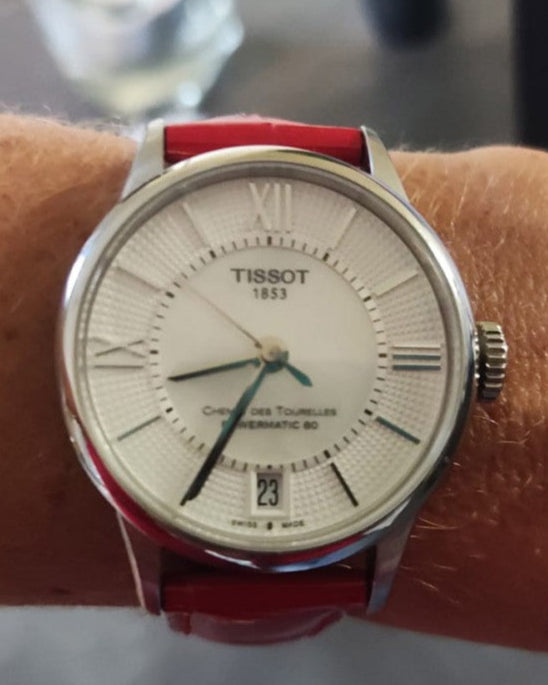 Tissot Chemin Des Tourelles Automatic Mother of Pearl White Dial Red Leather Strap Watch For Women - T099.207.16.118.00 Buy Now By Tissot