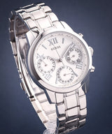 Guess Mini Sunrise Silver Dial Silver Steel Strap Watch For Women - W0448L1 Buy Now By Guess